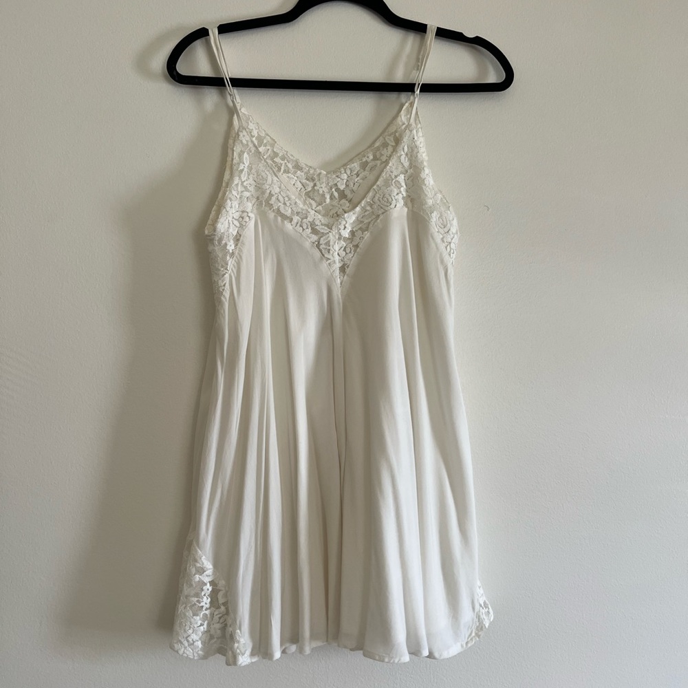 Small White Tobi Black Slip Dress with Beautiful Lace Accent Details
WITH TAGS